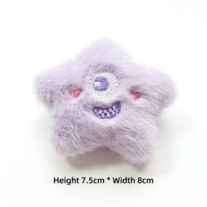 Detailed view of plush purple star monster accessory with 7.5x8cm size embroidery