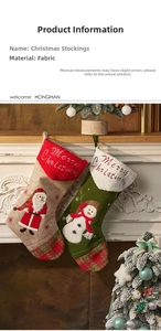 Detail of Christmas stockings with Santa and Snowman embroidery on a fireplace mantel