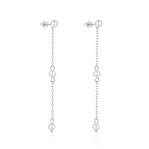 Detailed view of long S925 sterling silver tassel earrings with three white pearls