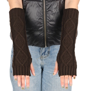 Close-up of deep brown diamond cable knit arm warmers with fingerless design for winter
