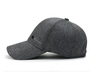 Vue latérale détaillée d'une casquette grise avec broderie SPORTMEN et texture tissu