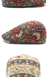 Detail view of ethnic jacquard pattern beret hat with colorful geometric weaving