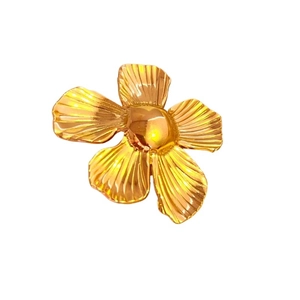 Elegant gold flower earrings with irregular metal texture in a five-petal floral design