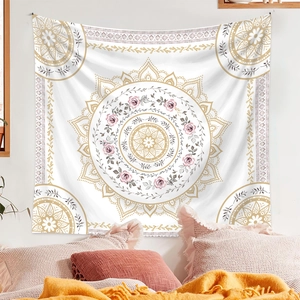 Detail of bohemian mandala tapestry with pink floral roses on soft white fabric background