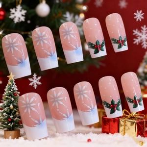 French tip press-on nails with Christmas snowflake and holly berry designs on nude base
