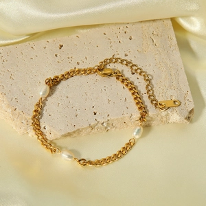 Elegant 18K gold plated titanium bracelet featuring three natural freshwater pearls