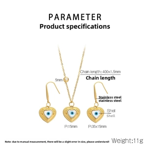 Detail of 18k gold plated stainless steel evil eye jewelry set with shell hearts