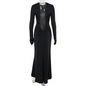 Detail view of the backless design with metal eyelets and lace-up ties on black maxi dress