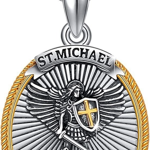 Vintage silver and gold St. Michael shield necklace with detailed guardian knight relief