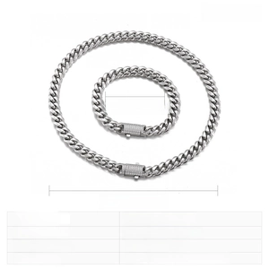 Detail of silver stainless steel Cuban chain set with iced out rhinestone buckle