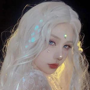 Close-up of white long wavy wig with holographic glitter accents for music festivals