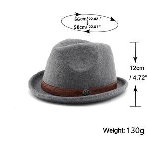 Detail view of grey fedora hat with embossed brown band and vintage metal buckle