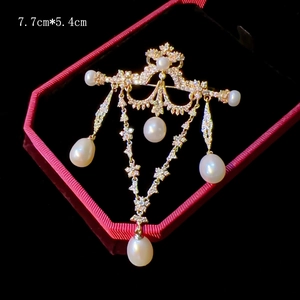 Elegant gold phoenix brooch with natural pearls and tassels in a red velvet gift box
