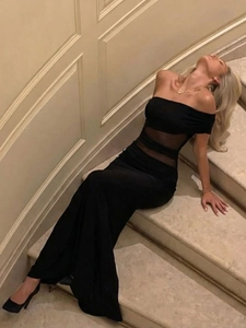 Elegant black off-shoulder mesh patchwork evening dress with a slim-fit fishtail hem