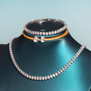 Detailed view of luxury silver water drop zircon necklace, bracelet and earrings set