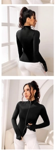 Front and back view of slim fit black sports jacket with thumb holes and stand collar