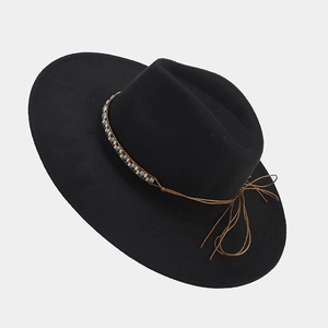Detail of bohemian woven band with colorful beads on a black wide brim wool felt fedora