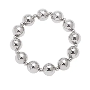 Polished silver beaded bracelet with sleek round beads on a minimalist white background