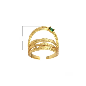 Detail of adjustable gold multilayer ring featuring a central green oval gemstone