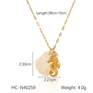 Detail view of 18K gold stainless steel starfish and shell pendant with size measurements