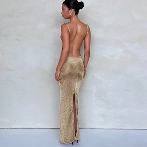 Elegant gold knitted dress featuring a deep open back and a long slit on the back hemline