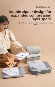 Gray and white compression travel bag showing volume comparison with double zipper design