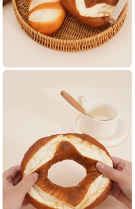 Macro shot of slow-rebound artificial pretzel and bread rolls showing soft PU texture