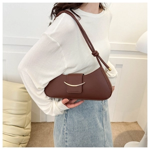 Deep brown crescent shoulder bag with gold metal buckle and knotted strap detail