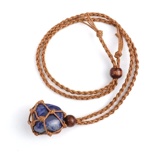 Detailed view of blue raw crystal stone secured in a brown hand-woven mesh net pendant