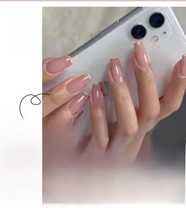Pink French press-on nails with golden glitter tips and minimalist translucent finish #JP2330