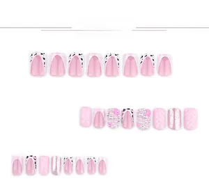 Macro detail of pink 3D water ripple press-on nails with pearls and leopard patterns