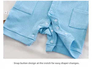 Detailed snap button closure and ribbed fabric texture on light blue baby bodysuit