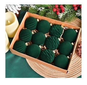 Set of 12 dark green velvet Christmas balls with gold hooks in a kraft gift box