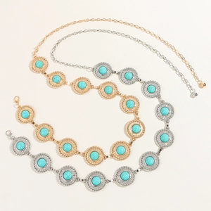 Detail of vintage turquoise waist chains in gold and silver finish for dresses