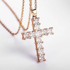 Rose gold cross pendant necklace featuring pavé square zircon stones with link chain