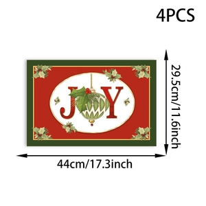 Set of 4 JOY Christmas placemats measuring 44x29.5cm with festive holly leaf design