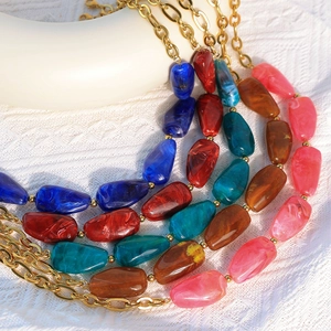 Irregular natural stone chunky link chain necklace with gold finish for a modern look