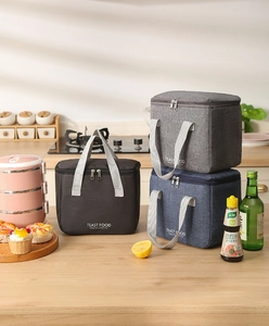 Black, gray and navy cationic insulated lunch bags with dual handles and secure zippers