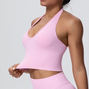 Detailed side view of pink seamless ribbed fabric showing texture and elasticity