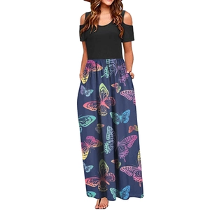 Detail of blue maxi dress with butterfly print and black cold shoulder bodice