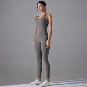 Side view of dark grey slim-fit yoga jumpsuit with high elasticity for athletic women
