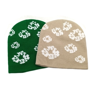 Green and khaki knitted beanies with floral pattern for winter windproof ear protection