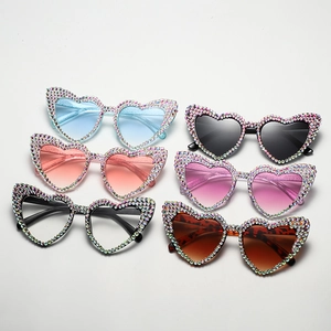 Vintage heart-shaped oversized sunglasses with rhinestone frames in six vibrant lens colors