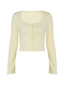 Cropped pale yellow ribbed knit cardigan with long sleeves and button-down front closure