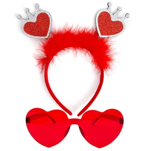 Detail of red glitter heart headband with feathers and matching heart shaped sunglasses