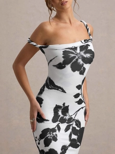 Sexy off-shoulder bodycon dress with black floral print on white background