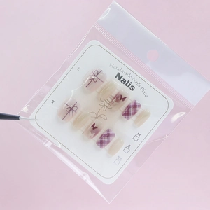 Cat-eye purple butterfly press-on nails set with elegant bow and plaid design