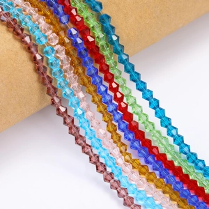 Close-up of multi-colored faceted bicone crystal glass beads for DIY jewelry making