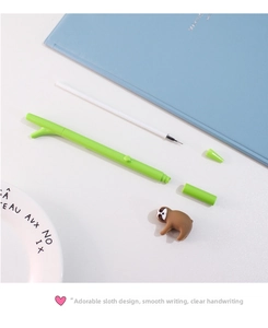 Disassembled view showing creative sloth pen parts with green branch body and brown sloth charm