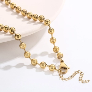 Golden stainless steel bead chain necklace with heart pendant and lobster clasp